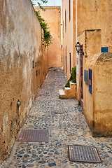 Image showing Greek picturesque scenic street of Oia town on Santorini island in Greece