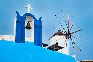 Image showing Old greek windmill on Santorini island in Oia town with stairs in street. Santorini, Greece