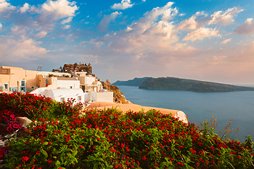 Image showing Tourist crowd gathered to watch the sunset in Oia Village, Santorini island, Greece