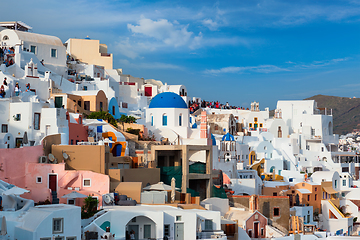 Image showing Tourist crowd in a viewpoint in Oia Village, Santorini island, Greece