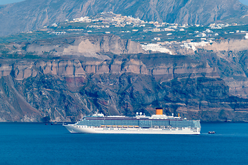 Image showing Cruise liner ship vessel in Aegean sea near Santorini island. Oia Fira village Santorini, Greece