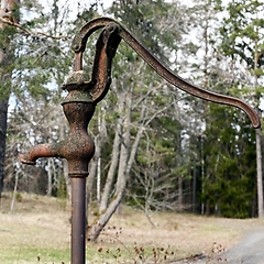 Image showing old rusty water column outdoors 