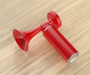 Image showing Air horn on wooden table
