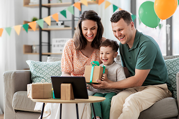 Image showing family with tablet pc has video call on birthday