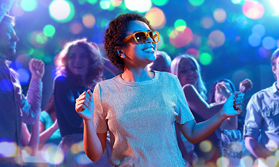 Image showing african american woman dancing at nightclub