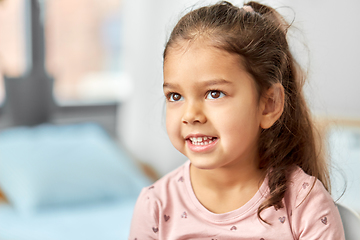 Image showing portrait of happy smiling little girl at home