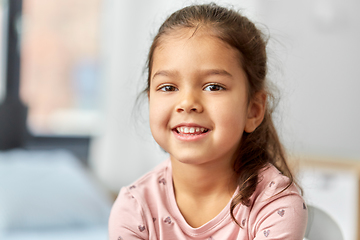 Image showing portrait of happy smiling little girl at home