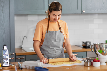 Image showing woman cooking food and baking on kitchen at home