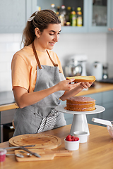 Image showing woman cooking food and baking on kitchen at home