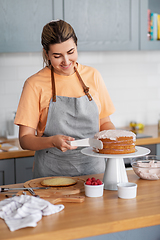 Image showing woman cooking food and baking on kitchen at home