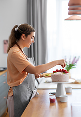 Image showing woman cooking food and baking on kitchen at home