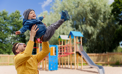 Image showing father with son playing and having fun outdoors