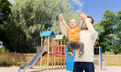 Image showing father with son playing and having fun