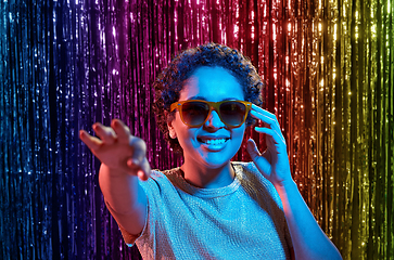 Image showing african woman in sunglasses at party