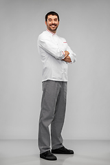 Image showing happy smiling male chef in jacket