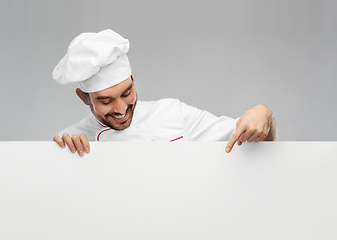 Image showing happy smiling male chef with big white board