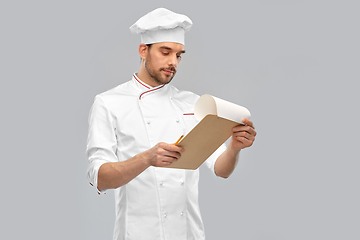 Image showing male chef with clipboard