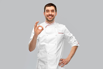 Image showing happy smiling male chef showing ok hand sign