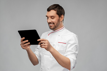 Image showing happy smiling male chef with tablet pc computer