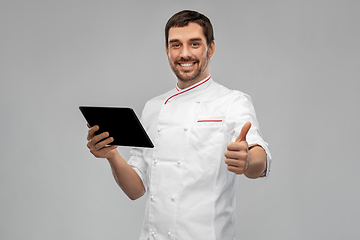 Image showing happy male chef with tablet pc showing thumbs up