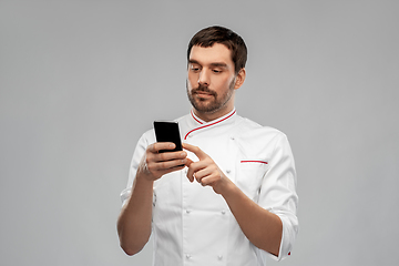 Image showing male chef with smartphone