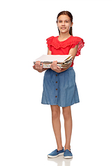 Image showing smiling girl with magazines sorting paper waste