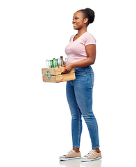 Image showing happy african american woman sorting glass waste