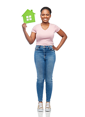 Image showing smiling african american woman holding green house