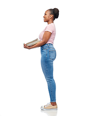 Image showing smiling african american woman sorting paper waste