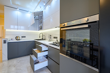 Image showing Luxury white and dark grey modern kitchen interior