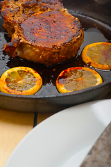 Image showing pork chop seared on iron skillet