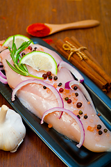 Image showing fresh organic chicken breast with herbs and spices