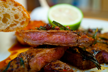 Image showing roasted grilled ribeye beef steak butcher selection