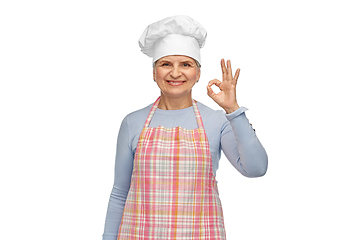 Image showing senior woman or chef in toque showing ok hand sign