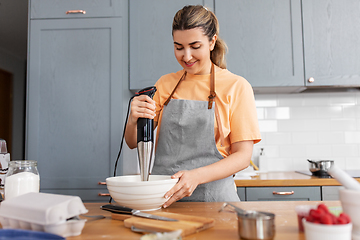 Image showing woman cooking food and baking on kitchen at home