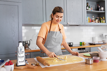 Image showing woman cooking food and baking on kitchen at home