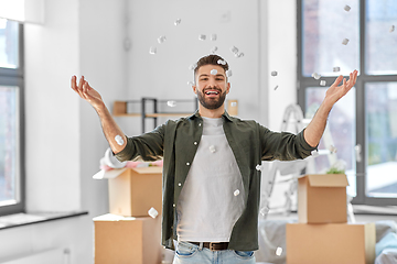 Image showing happy man with foam peanut moving to new home