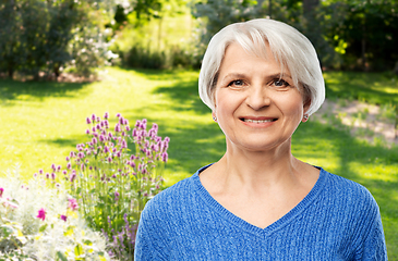 Image showing portrait of smiling senior woman in blue sweater