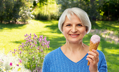 Image showing portrait of smiling senior woman with ice cream