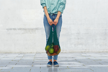 Image showing woman with food in reusable string bag