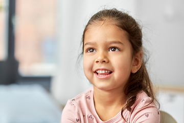 Image showing portrait of happy smiling little girl at home