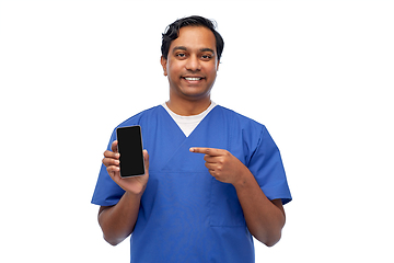 Image showing smiling doctor or male nurse with smartphone