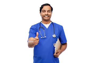 Image showing smiling doctor or male nurse showing thumbs up