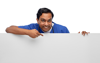 Image showing smiling male doctor or nurse with big white board