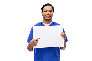 Image showing smiling male doctor or nurse with white board