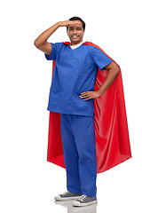 Image showing smiling doctor or male nurse in superhero cape