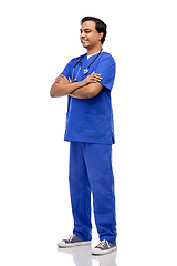 Image showing happy indian doctor or male nurse in blue uniform