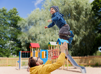 Image showing father with son playing and having fun outdoors