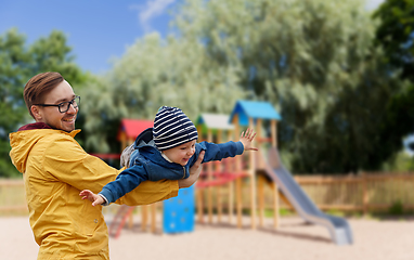 Image showing father with son playing and having fun outdoors