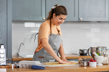 Image showing woman cooking food and baking on kitchen at home